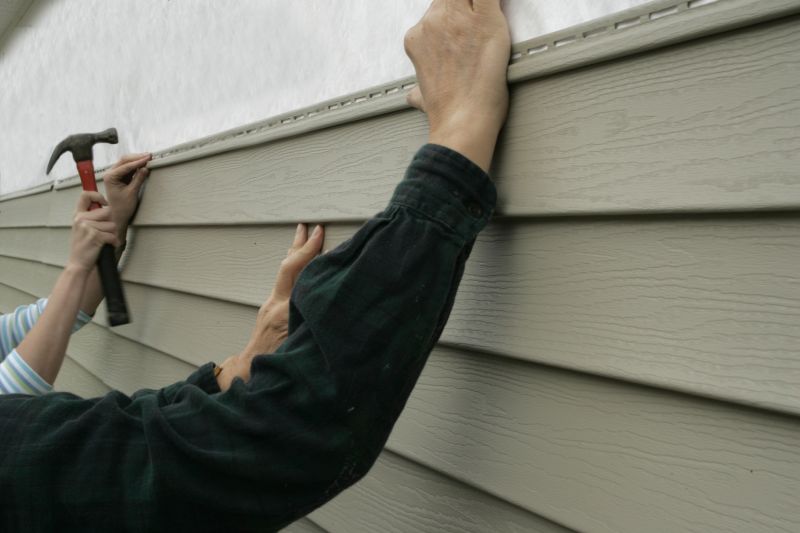 Installing Vinyl Siding on a House